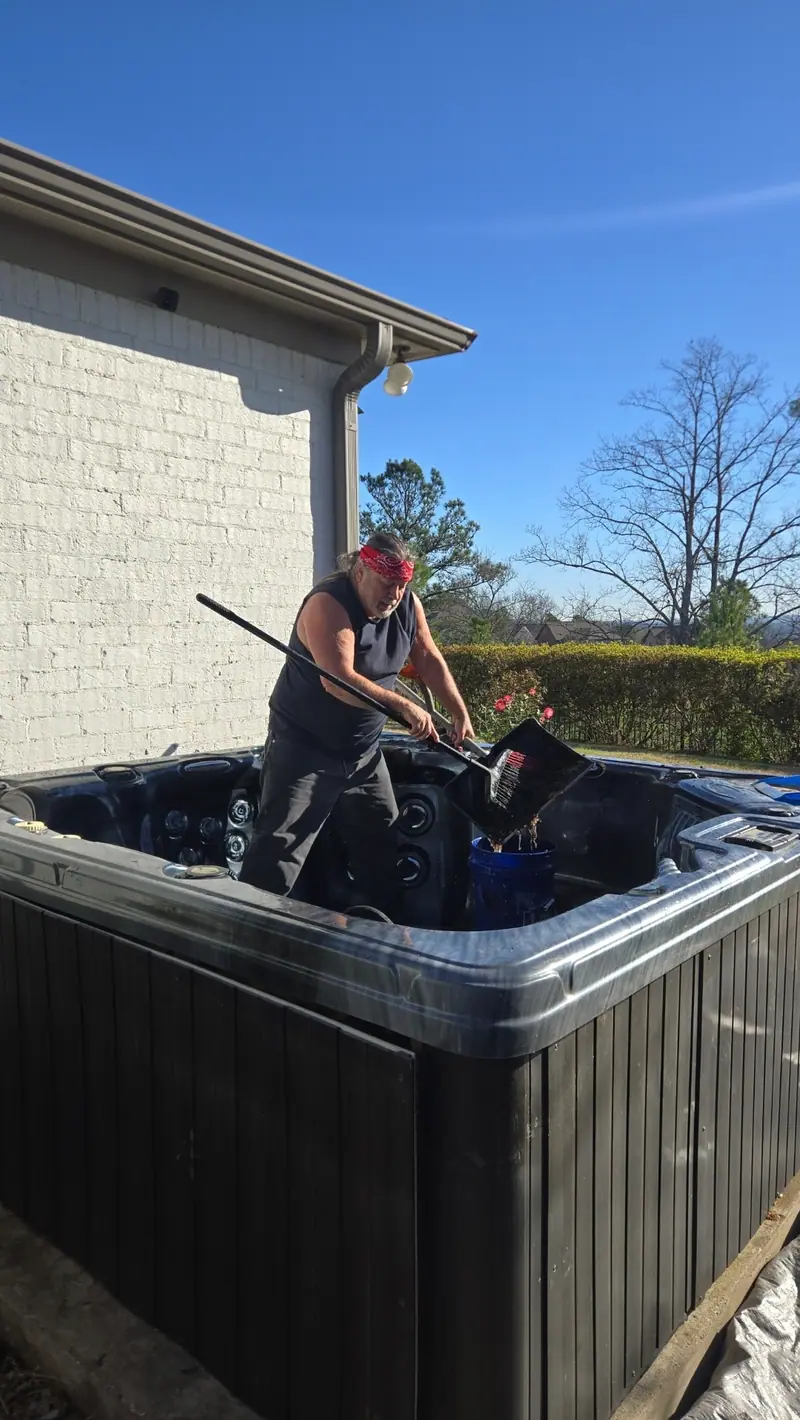 A hot tub being broken down for removal